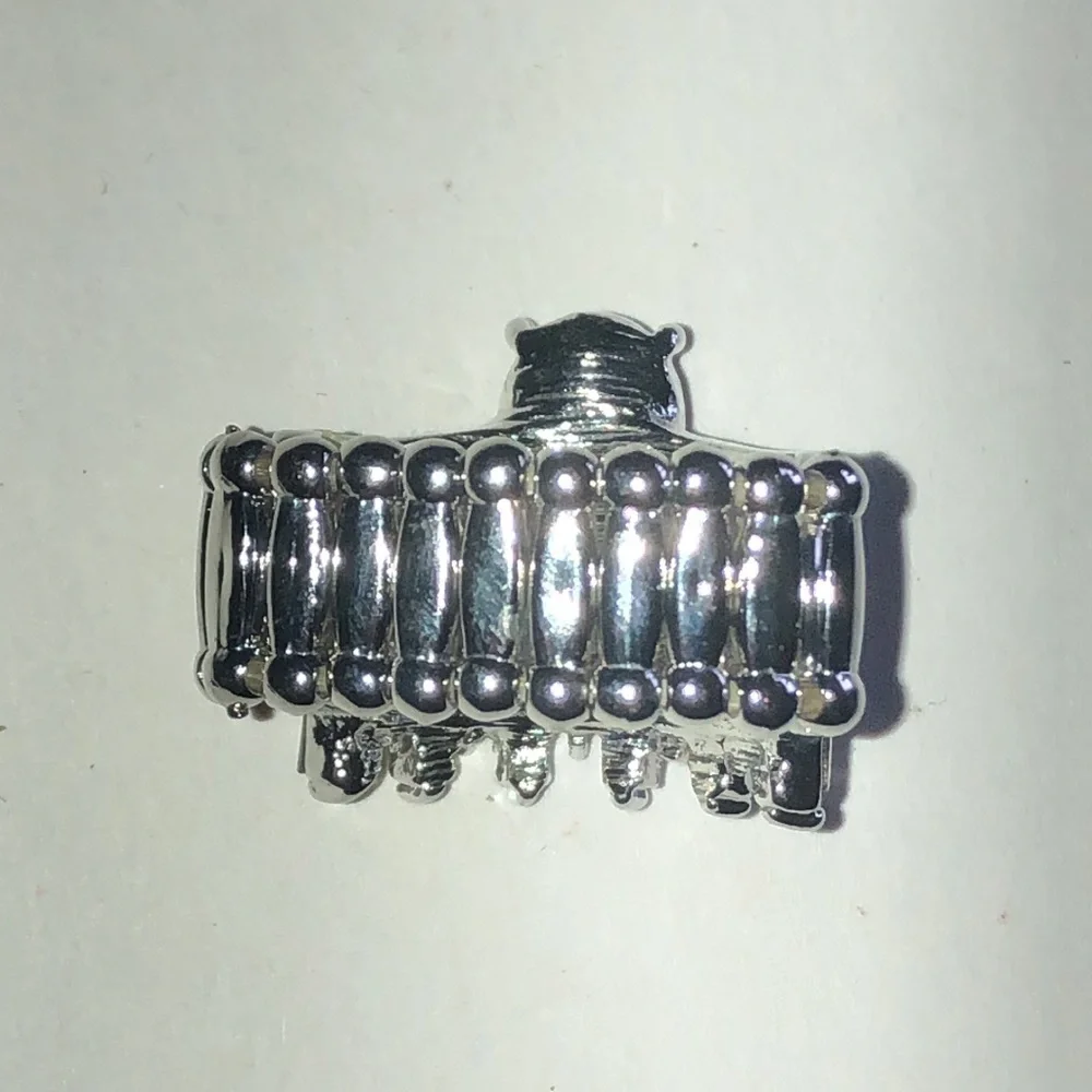 Silver Tone Ring with Fuchsia Oval Center Stone and Clear Accents